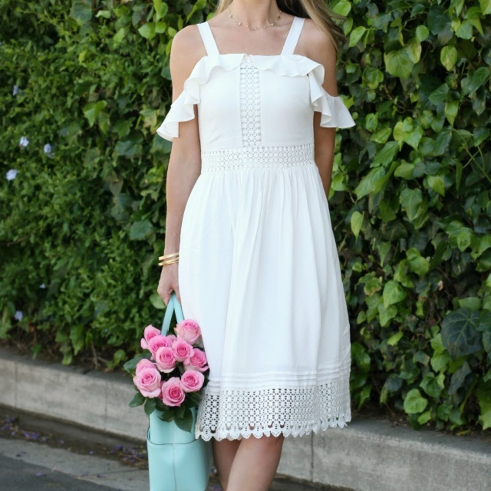 White loft dress with ruffle shoulder strap